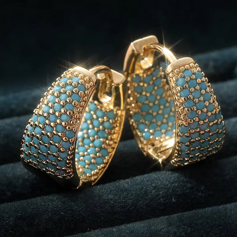 Aros con cuentas turquesa de tono dorado | Oro